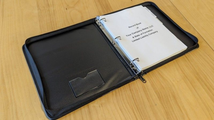 GoBook black leather binder for storing corporate documents.